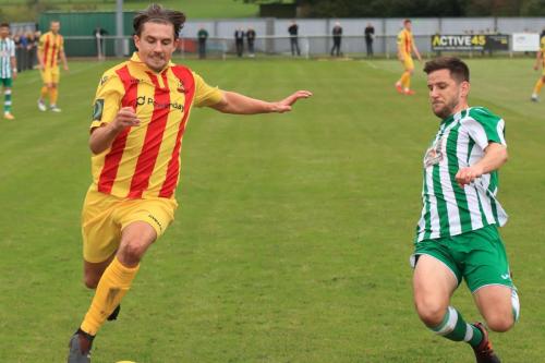 Enfields Sam Youngs (L) and Chichesters Matt Axell