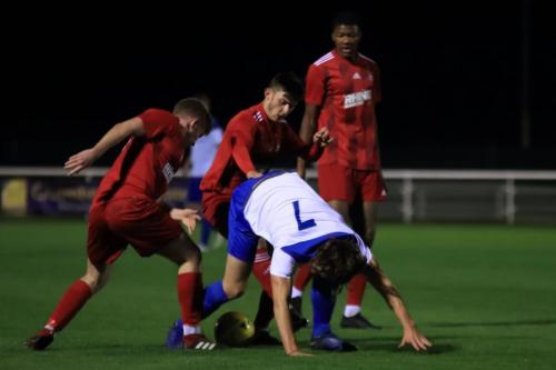 Enfields Roman Campbell is crowded out by the Northwood defence