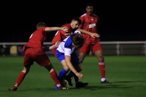 Enfields Roman Campbell is crowded out by the Northwood defencex