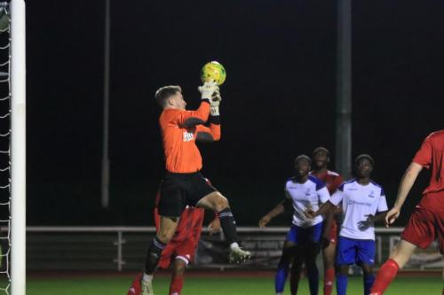Northwod keeper Alfie Bonfield misses a cross but is bailed out by the defender behind him