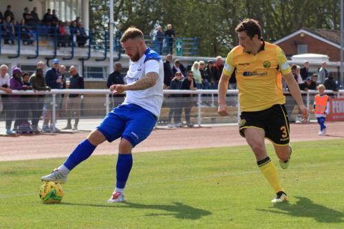 Enfields Billy Bricknell (L) and Rushdens Sam Brown