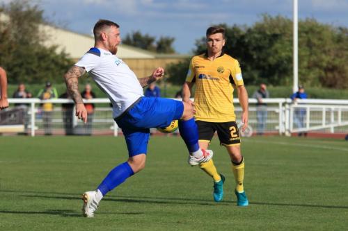 Enfields Billy Bricknell (L) and Rushdens Zack Reynolds