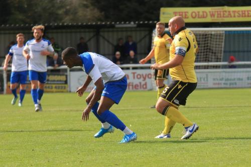 Enfields Ken Charles (L) and Rushdens Liam Dolman