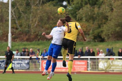 Enfields Lewis Taaffe (L) and Rushdens Alex Collard