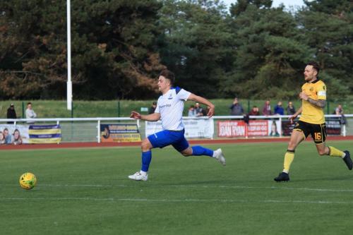 Enfields Lewis Taaffe (L) and Rushdens Sam Johnson