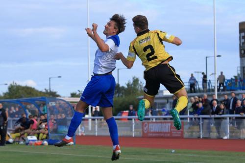 Enfields Sam Youngs (L) and Rushdens Zack Reynoldsx
