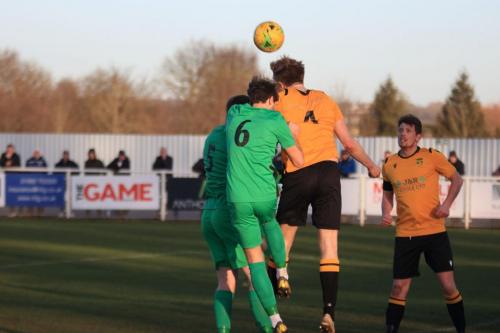Cheshunts Adam Crowther (amber  L) heads clear from Josh Urquhart (6) and Marc Weatherstonex