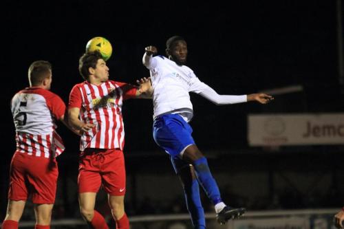 Enfields Muhammadu Faal and Folkestones Callum Davies (5) and Matt Newman