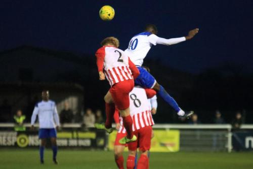 Enfields Muhammadu Faal and Folkestones Ronnie Dolan (8) and Finn OMara