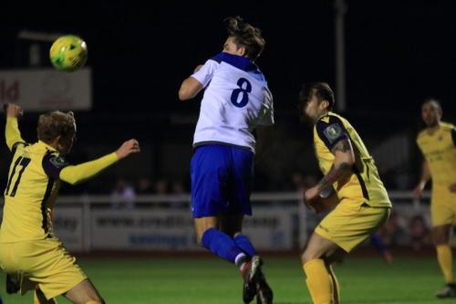 Enfields Sam Youngs and Hornchurchs George Winn (L) and Arthur Lee