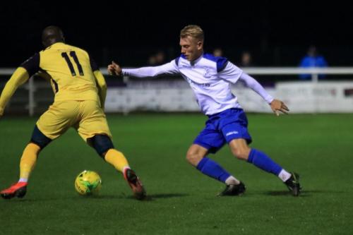 Hornchurchs Daniel Uchechi (L) and Enfields Ryan Blackman