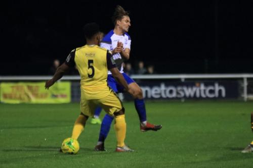 Hornchurchs Rickie Hayles (L) and Enfields Sam Youngs