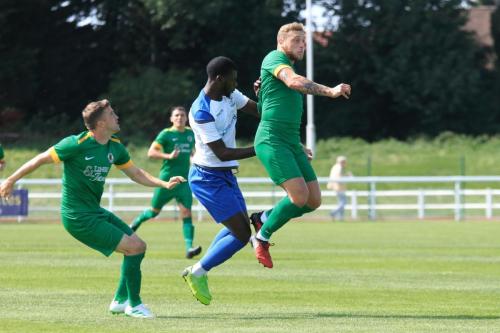 Enfields Junior Mubiayi and Horshams Steve Metcalf (L) and Will Miles