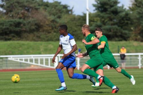 Enfields Ken Charles and Horshams Will Miles and Steve Metcalf (R)