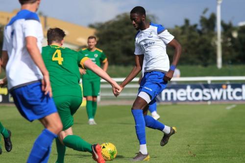Enfields Muhammadu Faal runs at Charlie Harris (4)