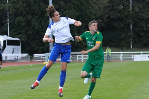 Enfields Sam Youngs (L) and Horshams Steve Metcalf