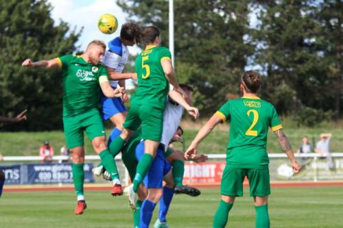 Enfields Sam Youngs (white, L) and Marc Weatherstone challenge Will Miles (L) and Ben Dyett