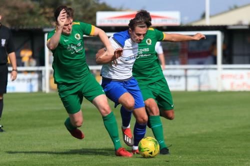 Enfields Sam Youngs and Horshams Charlie Harris (L) and Lea Dawsonx