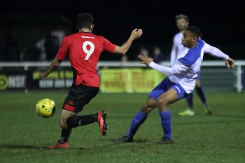 Enfields Jon Muleba (R) and Lewes Aaron Cosgrave