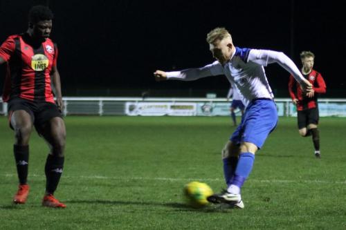 Enfields Ryan Blackman (R) and Lewes Christian Frimpong