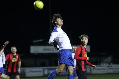 Enfields Sam Youngs wins a header