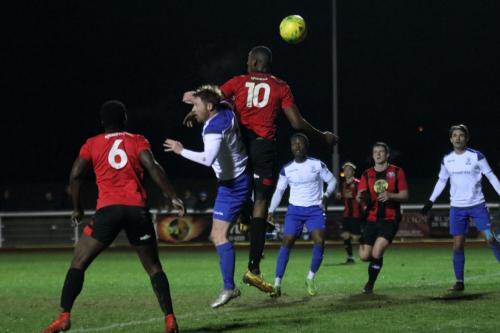 Lewes Berti Diau (10) challenges Marc Weatherstone