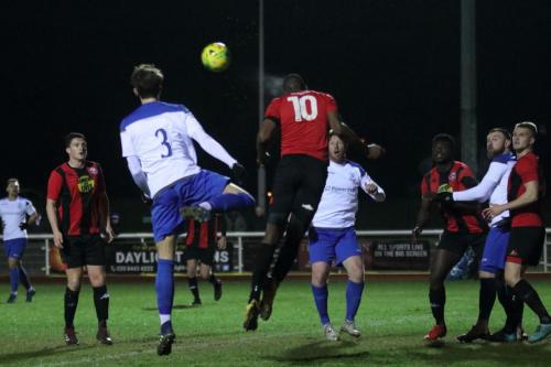Lewes Berti Diau (10) heads clear from Josh Urquhart