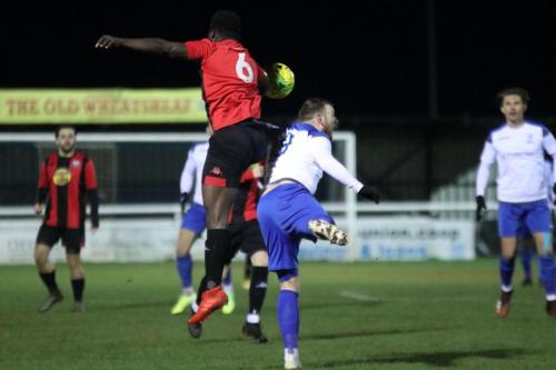 Lewes Christian Frimpong (6) challenges Billy Bricknell
