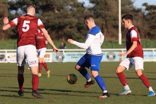 Enfields Billy Bricknell and Bognors Matt Casey (L) and Harry Kavanagh