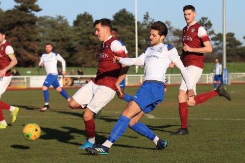 Enfields Josh Urquhart and Bognors Harry Kavanagh (L) and Matt Casey