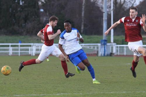 Enfields Ken Charles and Bognors Matt Casey (R) and Keaton Wood