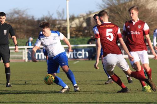 Enfields Lewis Taaffe and Bognors Matt Casey (5) and Tommy Leigh