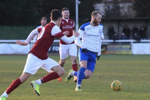 Enfields Sam Hatton (R) cuts in from the right wing as Josh Flint tries to cover