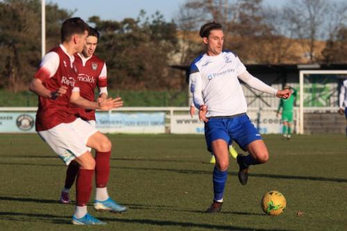 Enfields Sam Youngs and Bognors Harry Kavanagh (L) and Josh Flint