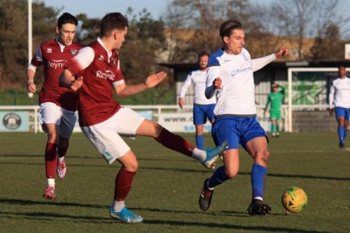 Enfields Sam Youngs and Bognors Harry Kavanagh (centre) and Josh Flint
