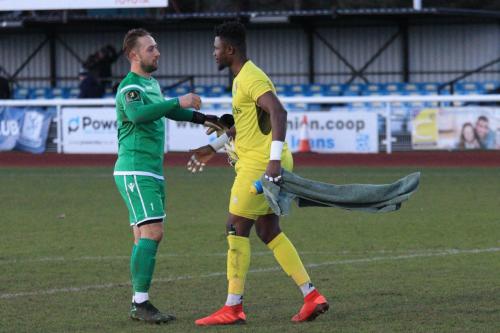 Keepers Nathan McDonald (Enfield, L) and Amadou Tangara shake hands at the end of the game