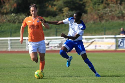 Braintrees Jake Hutchings (L) and Enfields Muhammadu Faal