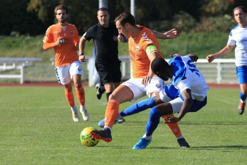 Braintrees Jake Hutchings (L) and Enfields Muhammadu Faalx