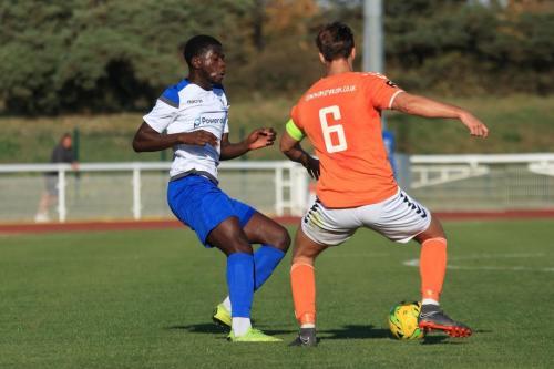 Enfields Junior Mubiayi (L) and Braintrees Jake Hutchings