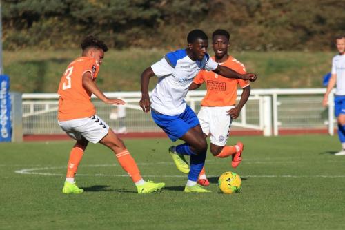 Enfields Junior Mubiayi and Braintrees Cameron Green (L) and Ade Cole