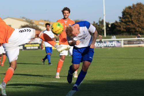 Enfields Ryan Blackman ducks to head the ball as Tyler Christian-Law tries to clear