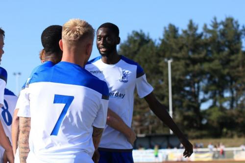 Muhammadu Faal (R) celebrates the first of his two goals