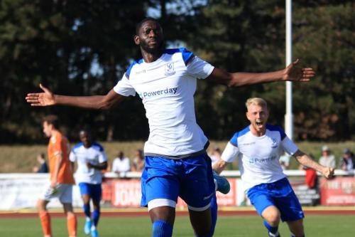 Scorer Muhammadu Faal (L) and provider Ryan Blackman celebrate the first goal