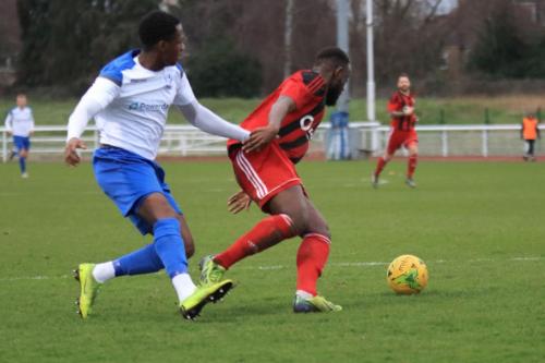Enfields Ken Charles (L) and Regents Jerry Kamanzi