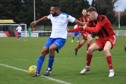 Enfields Kezie Ibe (L) and Regents George Forrest