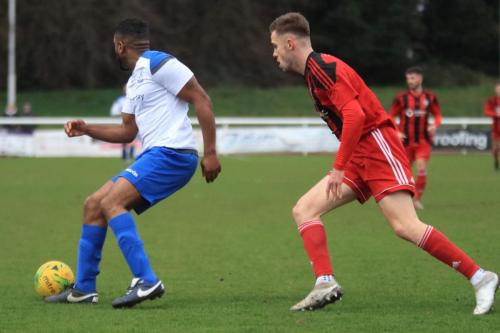 Enfields Kezie Ibe (L) and Regents George Forrestx