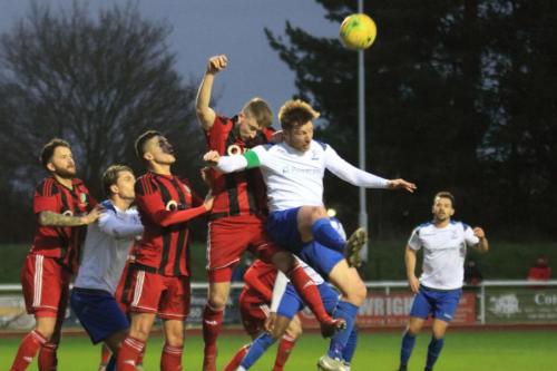 Regents Matt Cripps (red, R) challenges Marc Weatherstone