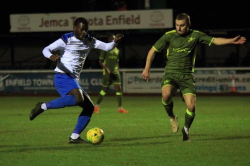Enfields Junior Mubiayi (L) and Carshaltons Ernold Haixhu