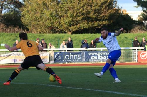 Enfields Billy Bricknell shoots as Sean Cronin tries to block