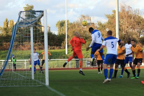 Enfields Ken Charles (9) heads over the bar